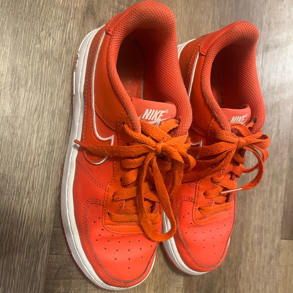 Red/orange Nike kids Nike air forces 4Y